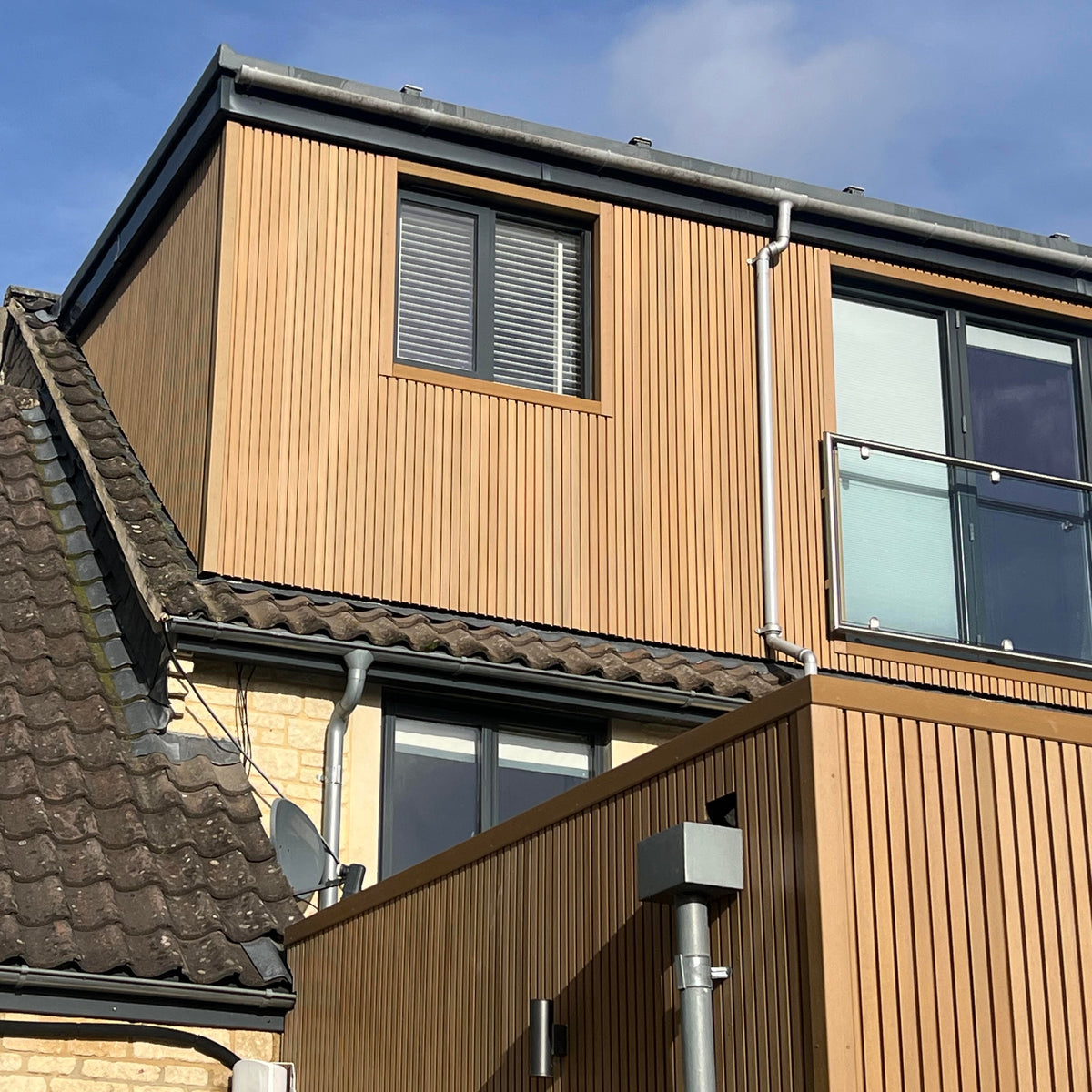 Cedar Light Brown Slatted Composite Cladding Board | EnviroBuild