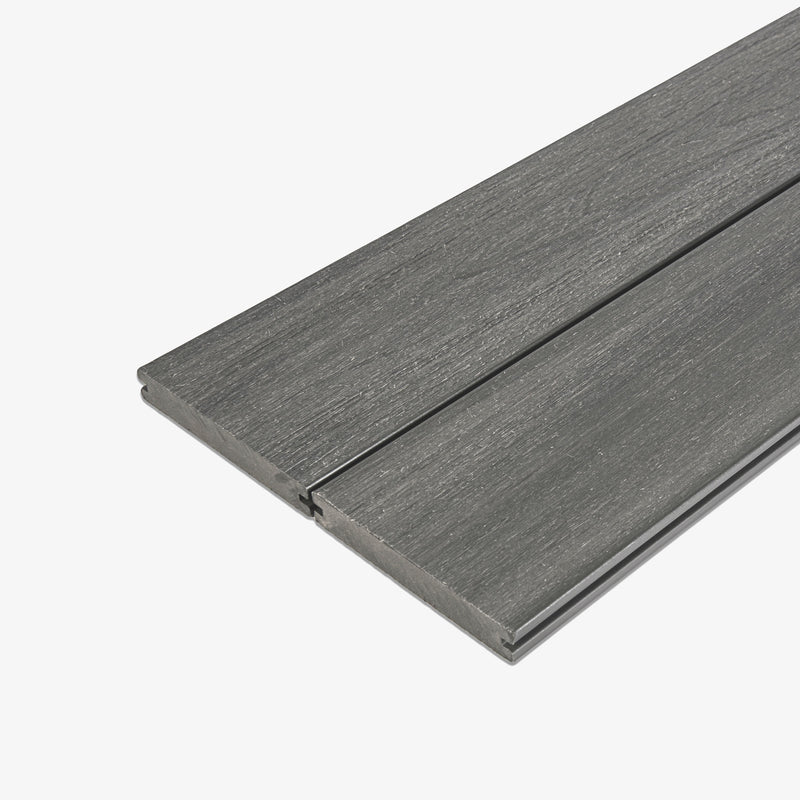 Two slate grey composite decking boards with a wood grain pattern, side by side on a white background.