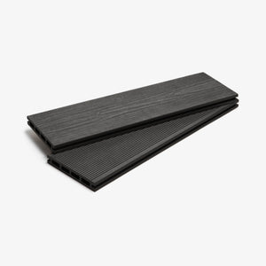 A pair of granite black composite decking boards placed side by side against a white background.
