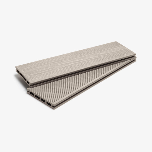 A pair of silver birch composite decking boards placed side by side against a white background.
